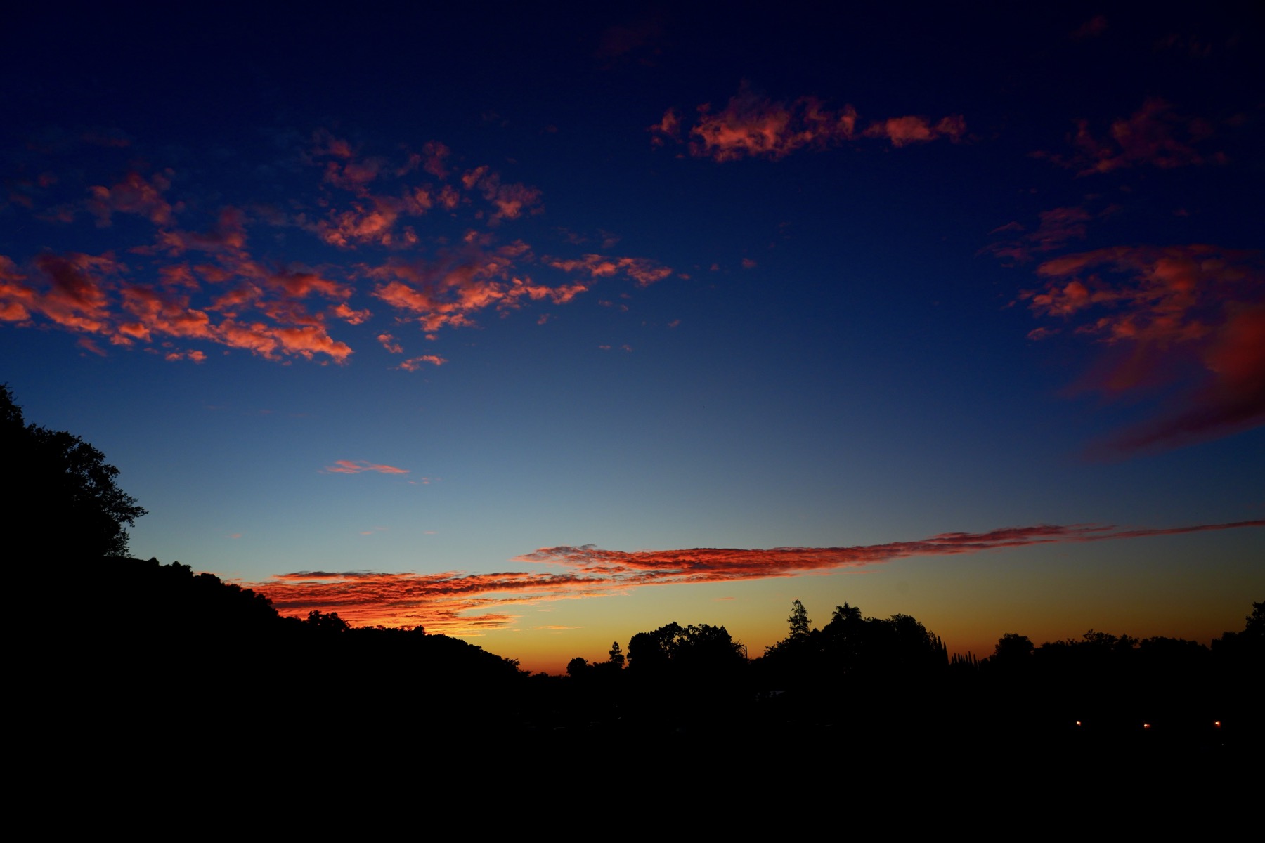 A very colorful sunset with a few clouds in the sky. It's not from this week though.